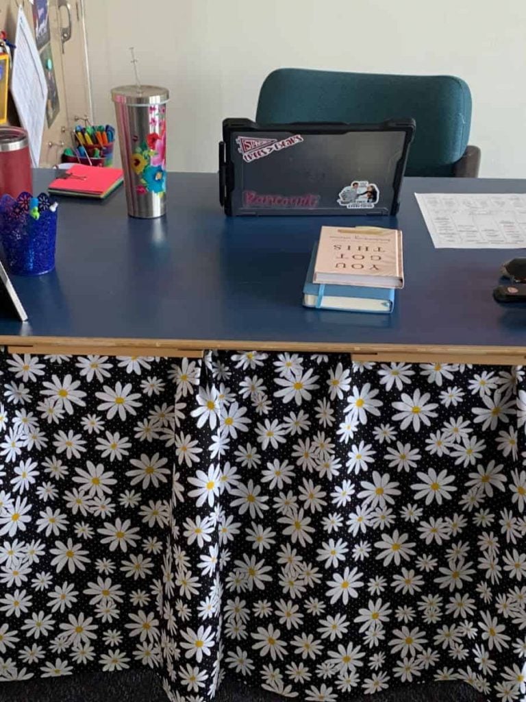 teacher desk ideas - curtain concealing cords and mess